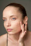 Applying foundation to dry winter skin for a smoother, more hydrated makeup finish